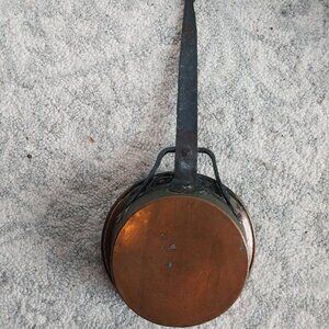 Antique copper pan with wrought iron handle